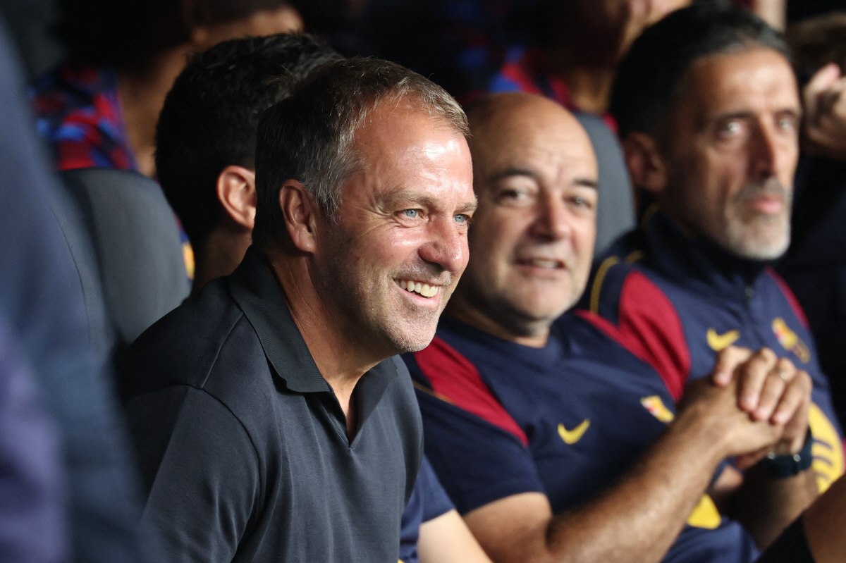 Barcelona's German coach Hans-Dieter Flick looks on before the UEFA Champions League first round day 1 football match between FC Barcelona and Feyenoord at Camp Nou stadium in Barcelona on September 9, 2026. (Photo by Lluis GENE / AFP)